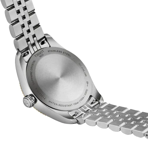 Photo montrant l'intégralité de la montre Tissot Ballade 34mm cadran gris, bracelet bicolore doré