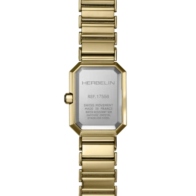 Une femme portant la montre Montre Herbelin Octogône – Quartz – Nacre Noire & PVD Or Jaune