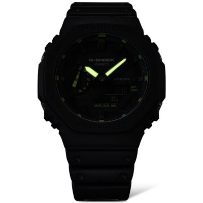 Image capturant l’ensemble de la montre Casio G-Shock GA-2100-1A3ER, avec aiguilles et index lumineux dans l’obscurité