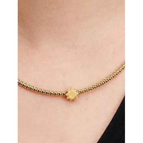 Photo présentant l’intégralité de la Mini Charm Soleil Texturé