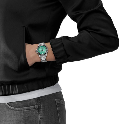 MONTRE TISSOT SEASTAR 1000 36MM CADRAN TURQUOISE BRACELET BICOLORE MÉTAL ARGENTÉ